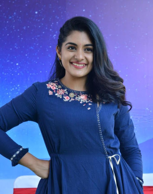 Nivetha Thomas Stills In Blue Dress At Tamil Movie Opening 8